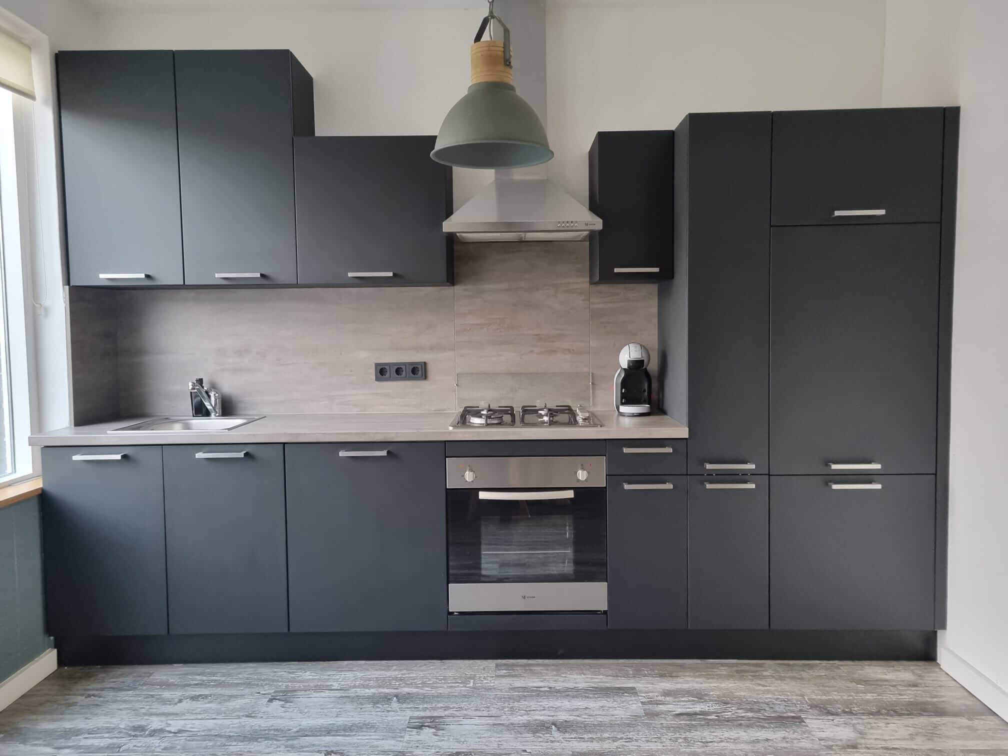 keuken gespoten